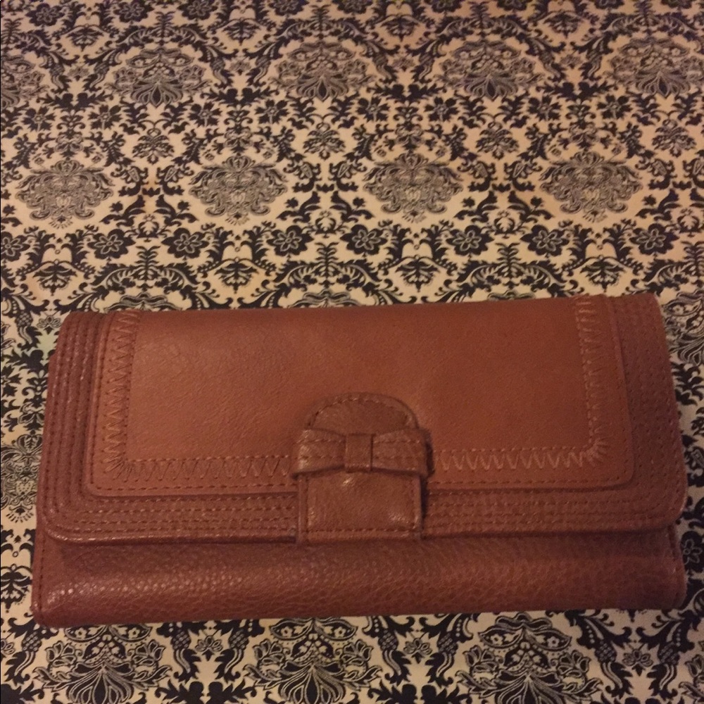Tan wallet great condition. Brand NICA